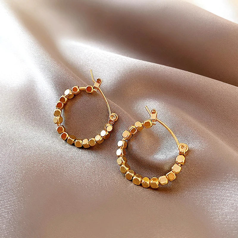 Lumière Faceted Hoop Earrings