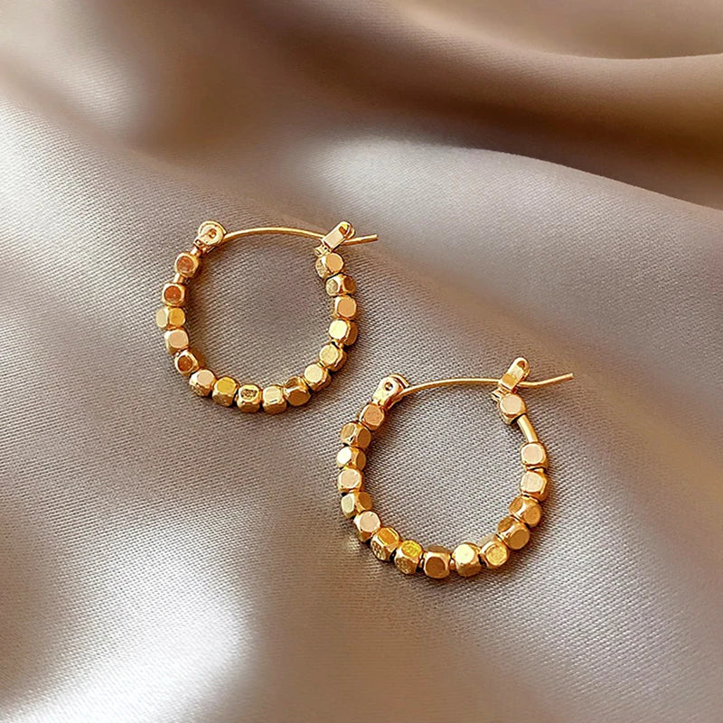 Lumière Faceted Hoop Earrings