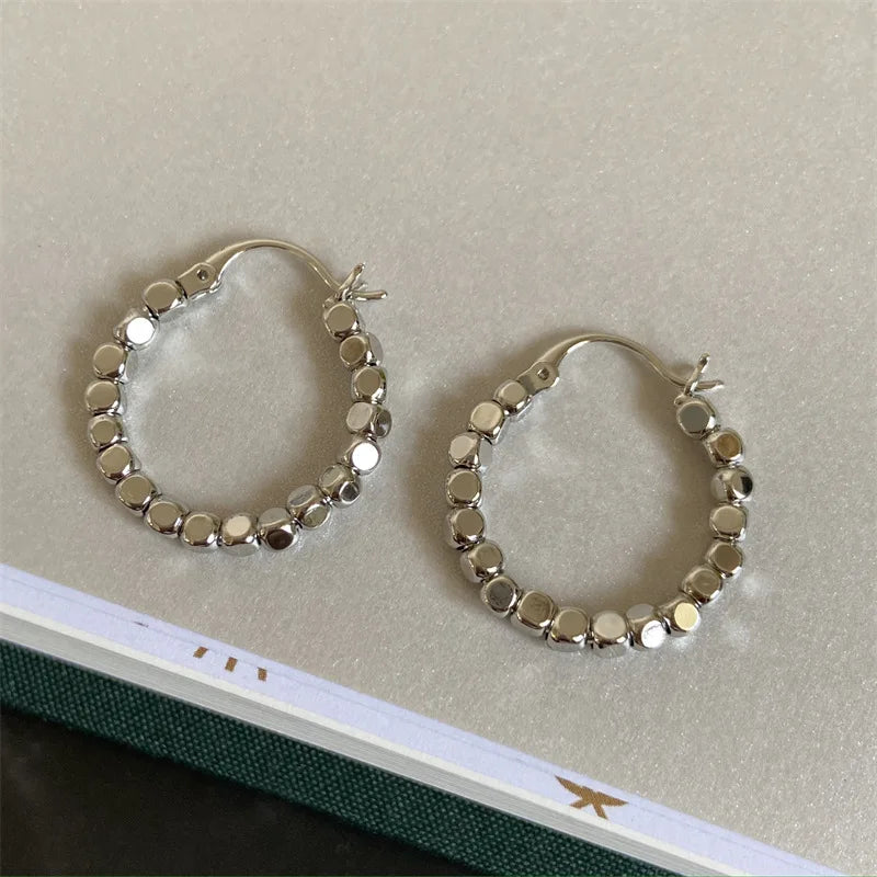 Lumière Faceted Hoop Earrings